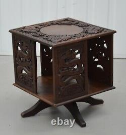 AN EARLY 20th CENTURY CHINESE CARVED REVOLVING TABLE TOP BOOKCASE