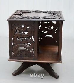 AN EARLY 20th CENTURY CHINESE CARVED REVOLVING TABLE TOP BOOKCASE