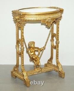 Circa 1920 Gold Giltwood Occasional Table With Mirror Top & Cherub Putti Swing