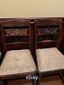 Mahogany antique dining table and 8 chairs, style of Chippendale