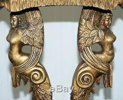 Pair Of Giltwood Side Tables Or Torchiere Stands Depicting Semi Nude Goddesses