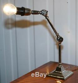 Pair Of Small Solid Polished Metal Table Lamps With Two Points Of Articulation