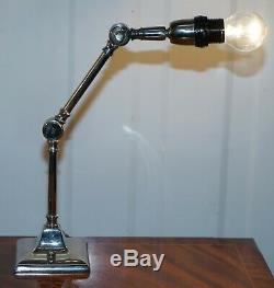 Pair Of Small Solid Polished Metal Table Lamps With Two Points Of Articulation