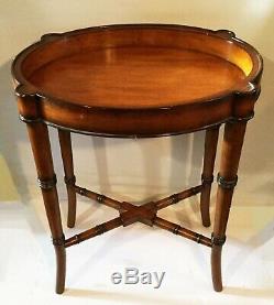 Vintage Chippendale style side table. Bar cart with elegance. Jeanne Reed's