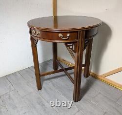 Vintage Lane Round Cherry/Mahogany Wood Chippendale Table