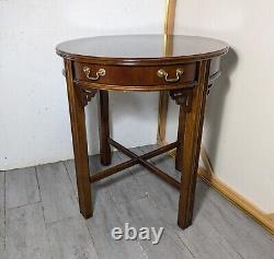 Vintage Lane Round Cherry/Mahogany Wood Chippendale Table