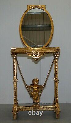 Circa 1920 Gold Giltwood Table Occasionnelle Avec Mirror Top & Cherub Putti Swing