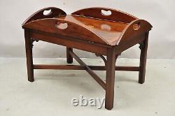 Table basse en acajou Hekman vintage avec plateau de service et incrustation en rosace.