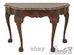 Table console en acajou Henkel Harris avec dessus en marbre et pieds griffes