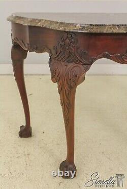 Table console en acajou Henkel Harris avec dessus en marbre et pieds griffes